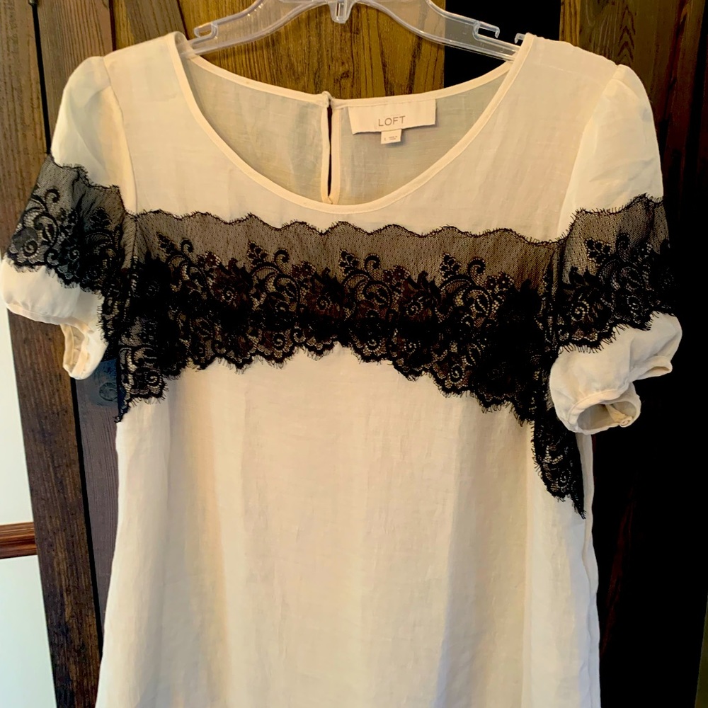 Beige. Black lace top